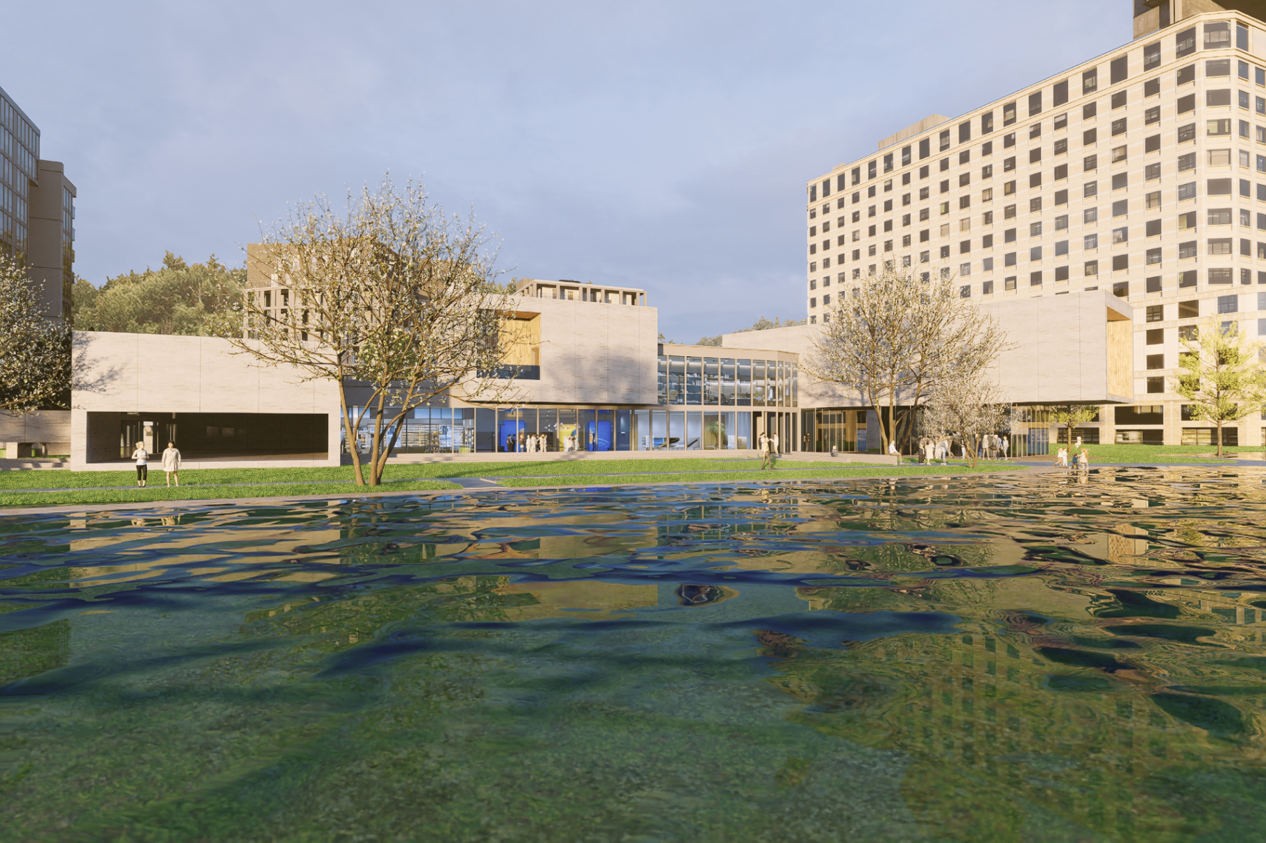 Wide view of the pavilion across the reflecting pool at golden hour